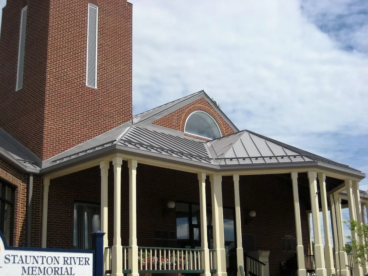 Skilled roofing craftsmen working on a residential roof in Roselle
